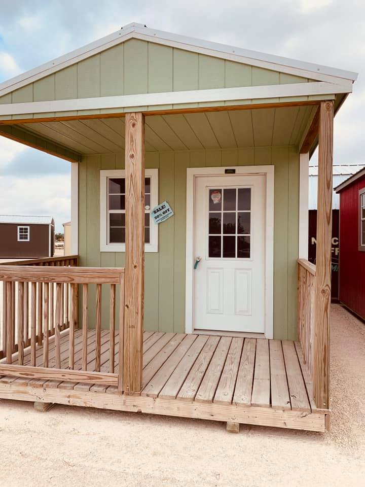 We found a small shed that was 25% off in Hondo, Texas. I like the green color and the small porch.