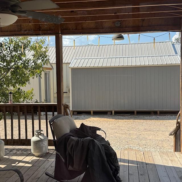 From our front porch, you can see the skirting was taken off of the 2 small buildings.