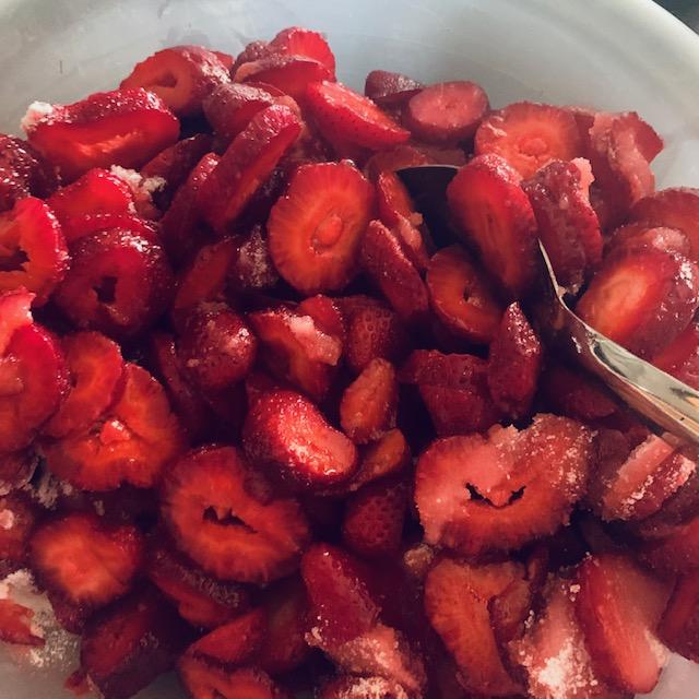 Part of the half flat of expensive strawberries that I cut up this morning.