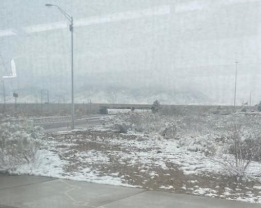 My sister sent me this shot of the snow right now as she is riding a city bus in El Paso.