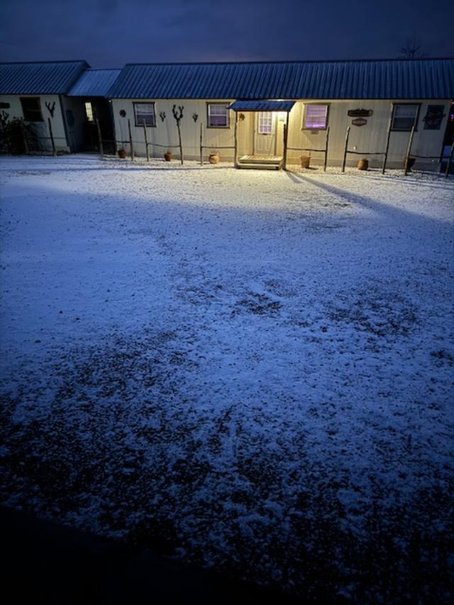 Here is our snowy parking lot this morning.