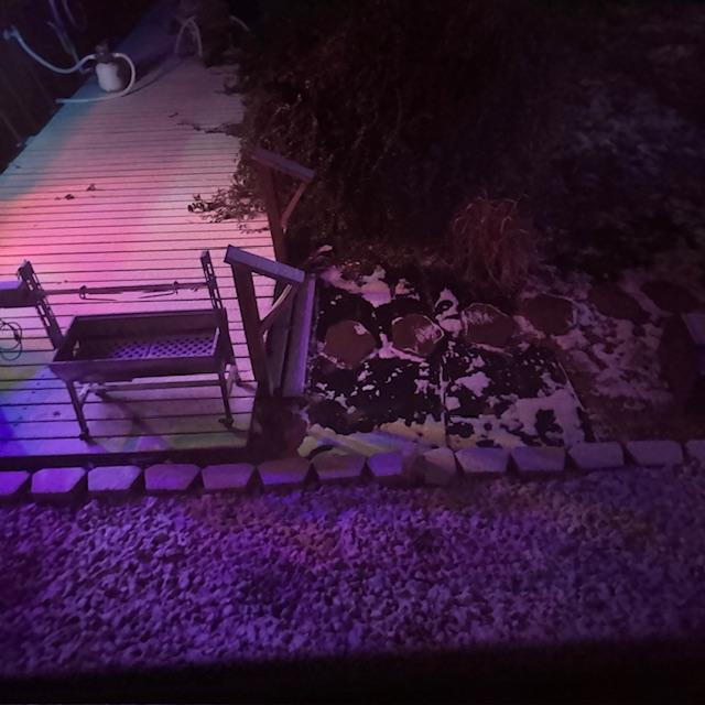 You can see some snow on the back deck and on the ground through the window at 6am.