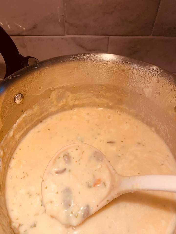 The broccoli cheddar soup I made for lunch. I added chicken, mushrooms, potatoes, peppers, and onions to make it even better.