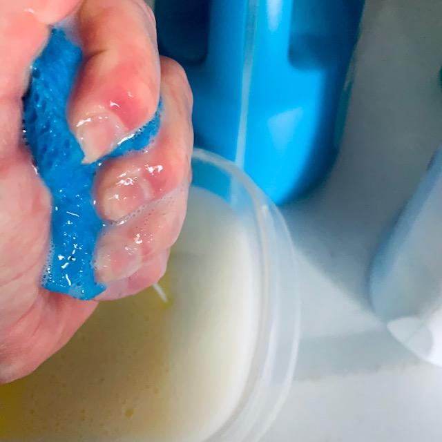 Squeeze it so it is not dripping wet.