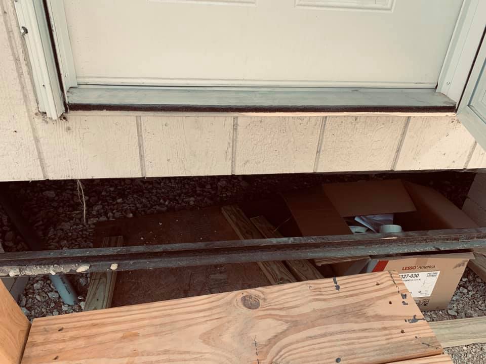 Just look at the amount of space between the top step and the doorway of the home. It is difficult for a short person to get in and scary to get out. I am only 5 feet tall. The railing has splinters. Just look at the amount of space between the top step and the doorway of the home. It is difficult for a short person to get in and scary to get out. I am only 5 feet tall. The railing has splinters.