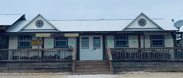 Our store this morning at 7am with the overcast grey sky. We have pecan firewood for sale on the porch. Once it warms up, we will have vegetable seedlings for sale.