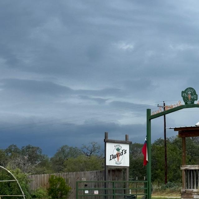 Our sign looks nice against the clouds. We did not get one drop of rain.