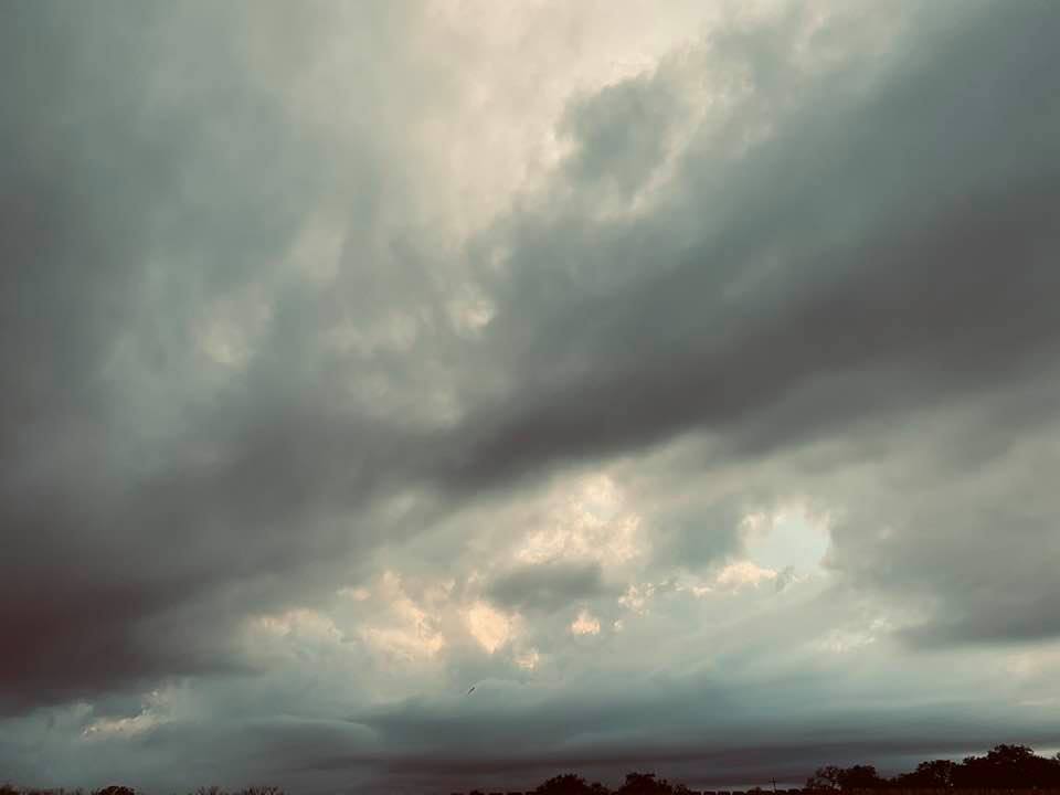 This is what the skies looked like at 5pm this evening. Shortly after, it rained. The wind is high and the temp is down to 49° so far.
