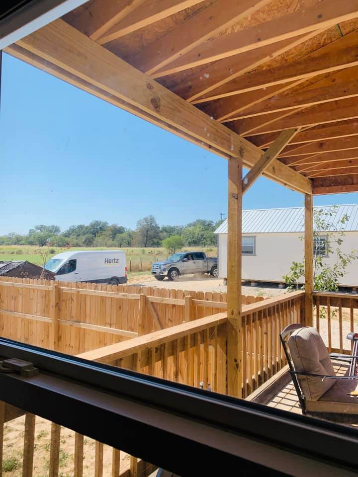 The driver's boss arrives, hooks up a tow line and begins to destroy our driveway in 3 positions.