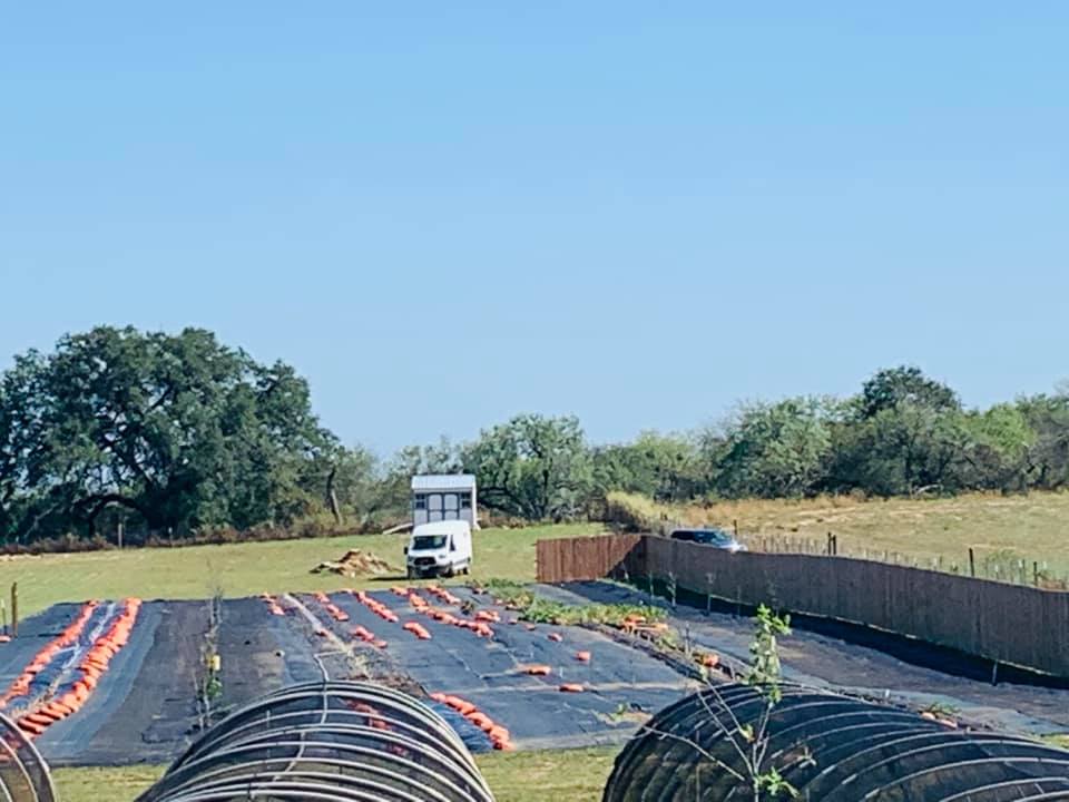The truck is going back down and the van driver is paused for a moment before he is pulled along back down.