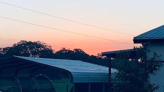 The sun coming up over the carport here on the farm. What a gorgeous pink sky this morning!