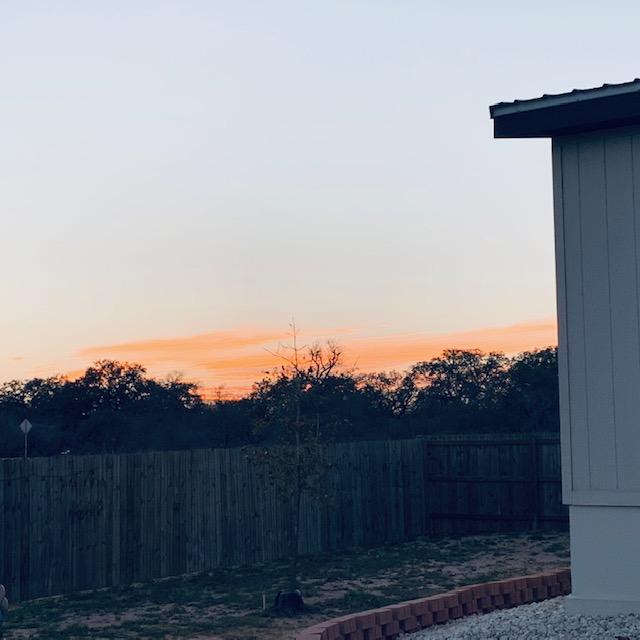This is the view of the sunset this evening when I went out to the greenhouse to check on my heirloom tomatoes.