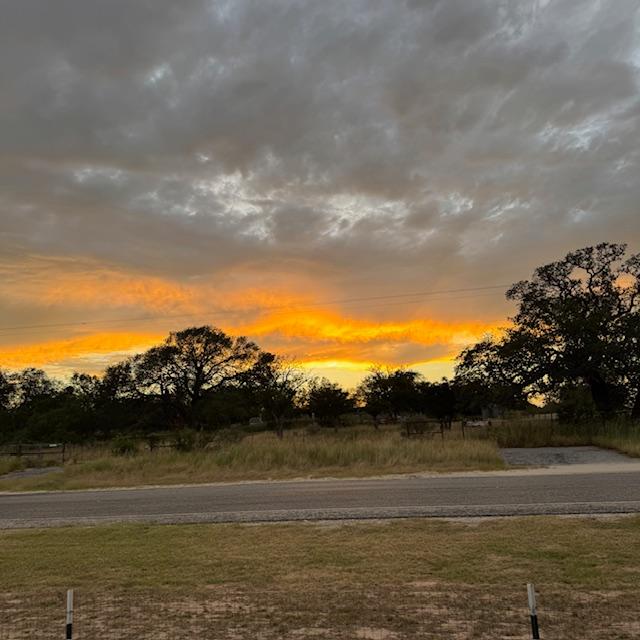 Here is our sunset this evening from the porch in between the store and my office.