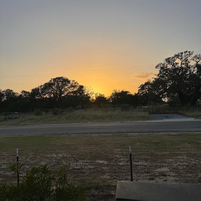 Here is the sunset from the porch between my office and the Farm Store.