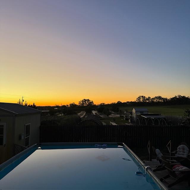 Sunrise over the old oak tree.