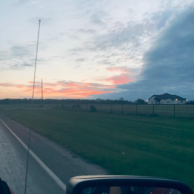 Tonight's sunset was taken in the truck as we were driving into Devine to find a thin tree.