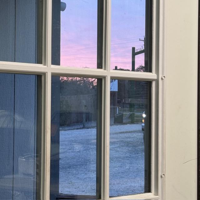 I saw the sun going down through this window as I filled orders. I decided to go out and get a better photo.