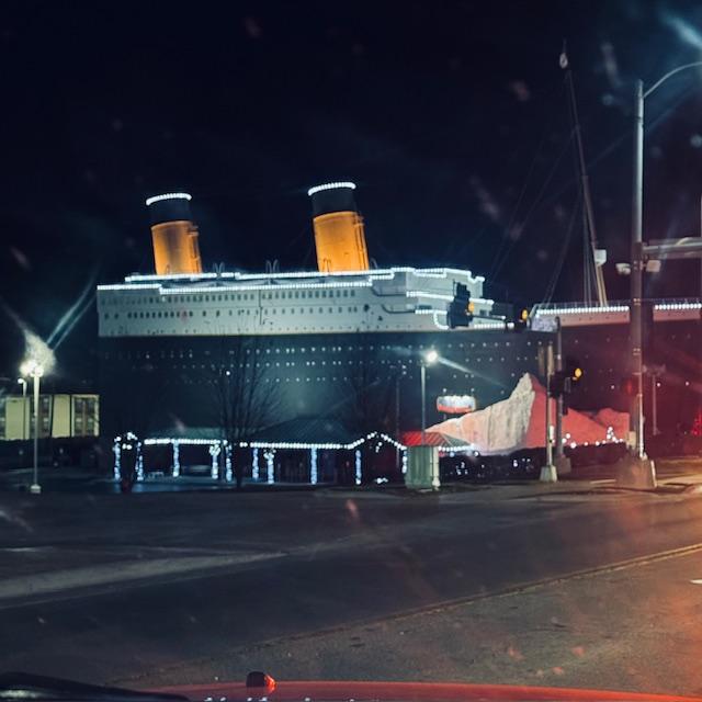 Titanic Museum Attraction in Branson is lit up at night. It looks cool!