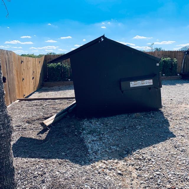 The Apache Disposal man moved the dumpster, forcing the logs that were spiked into the ground to move, tearing up our landscaping. In 3 years, he has never managed to do this before.