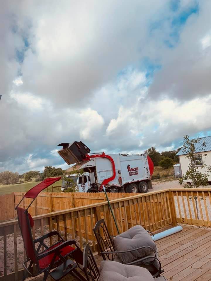 The trash man showed up twice during Grand Opening week to dump our overflowing can. Here he is this morning.