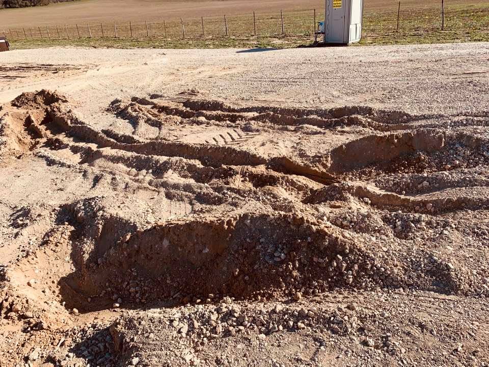 The holes left by the Home Depot truck will have to be repaired. They are big and deep.