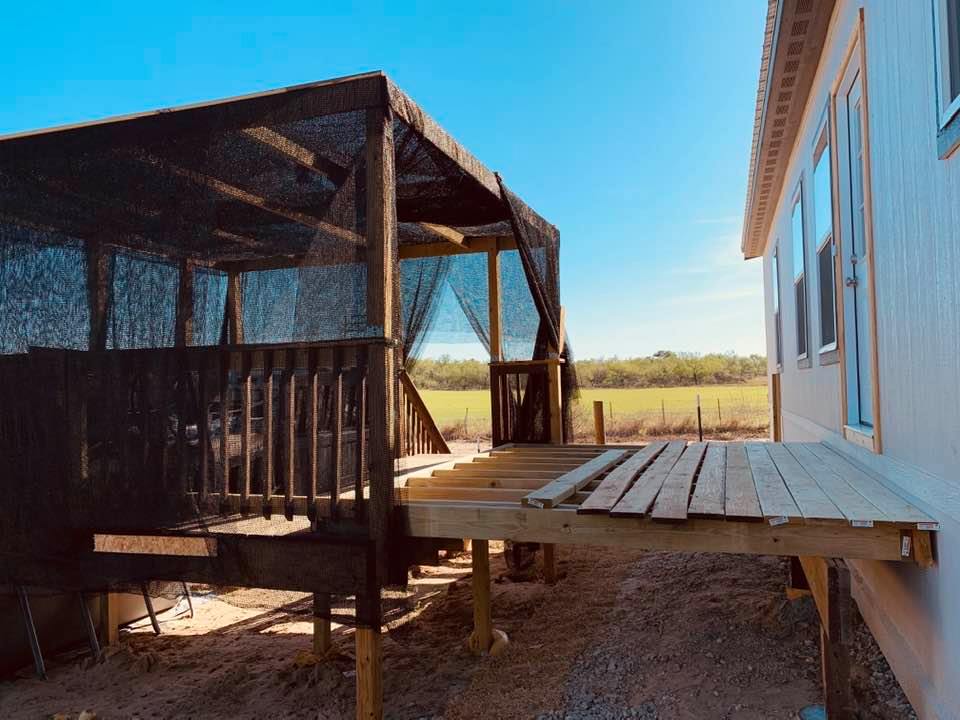 The unfinished deck will hook the pool deck to the kitchen door we had installed.
