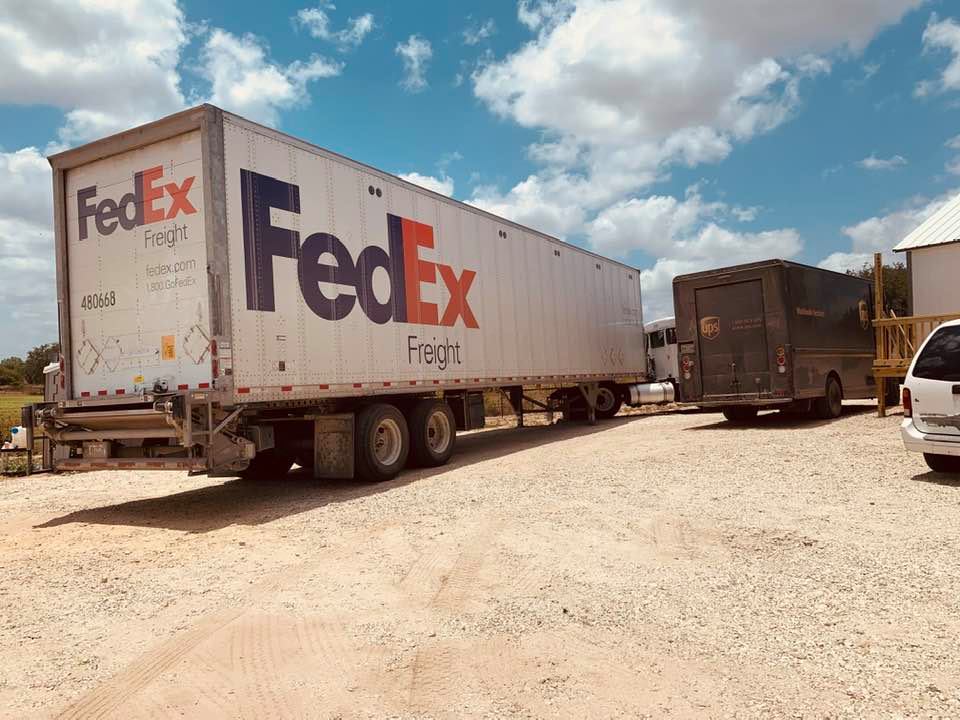 UPS was able to squeeze past the stuck FedEx truck. FedEx would not call for a tow even though we told him he is #16 to get stuck and no way he will get out without a tow.