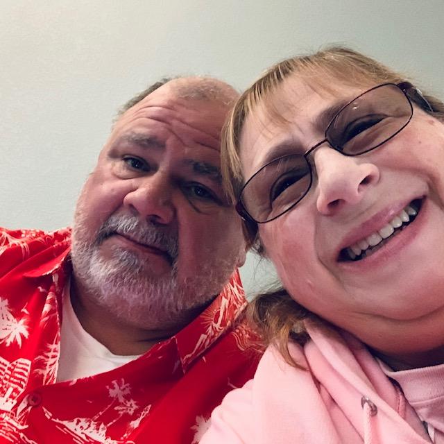 This was taken this morning of us in our red and pink for Valentine's Day. 35 years ago today he gave me my first Valentine, a huge card of a dog, a stuffed dog, and red roses.