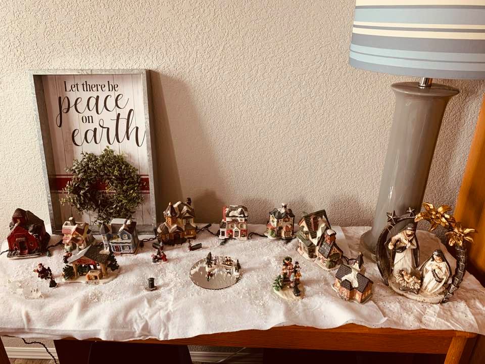 Here are a few Christmas village pieces along with a nativity on the entry table.