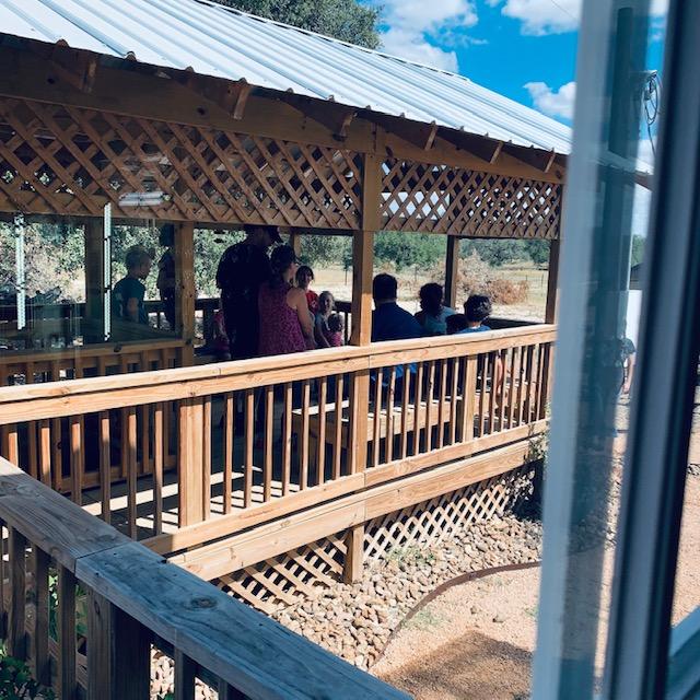 Some of the visitors are on the gazebo.