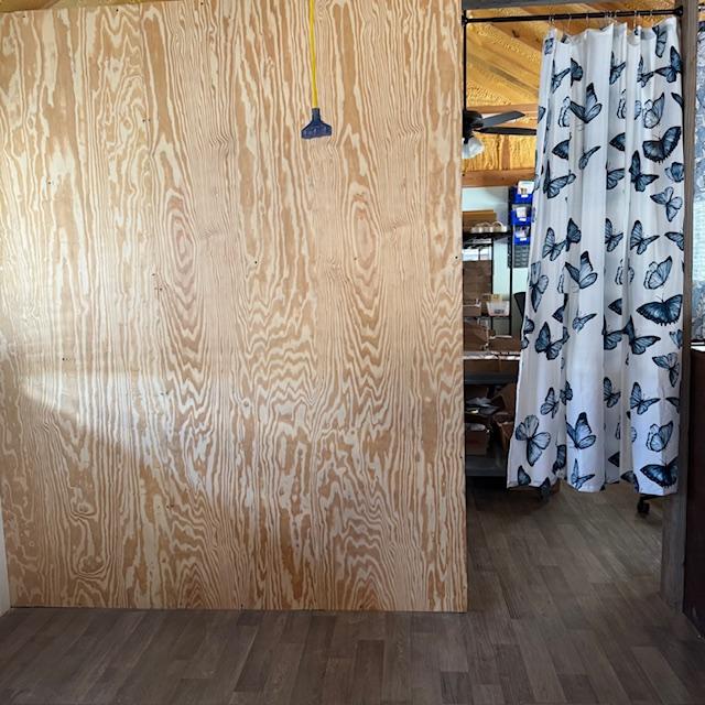 For now, here is the wall in the farm store with some curtains. We will add a door later but for now, it should keep most folks out as we count and pack seeds.
