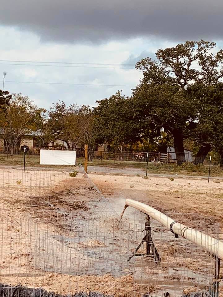 The dirty water is just shooting out of the pvc pipe, watering our front yard. Hopefully, the weeds don't grow back.