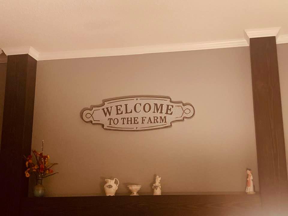 Our welcome to the farm sign looks great over the mantel in our living room.