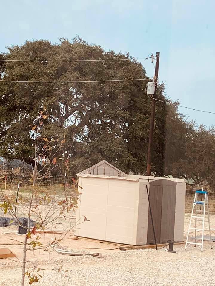 The well house is finally going up to protect the pump.