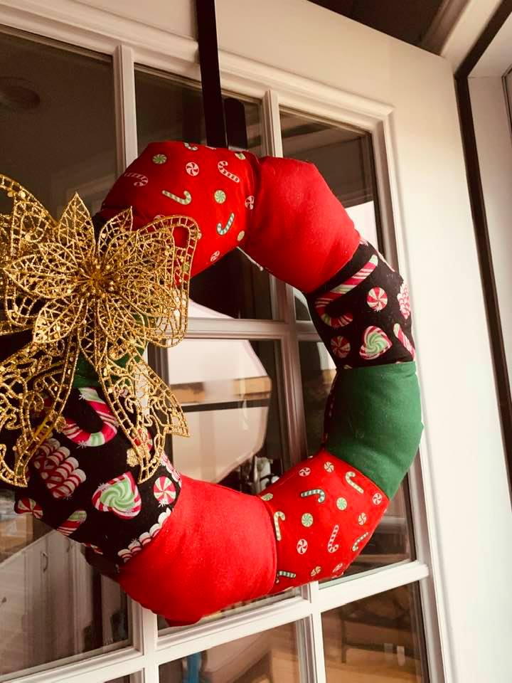 This wreath is on our backdoor. I made it a few years ago, sewing it on my sewing machine.