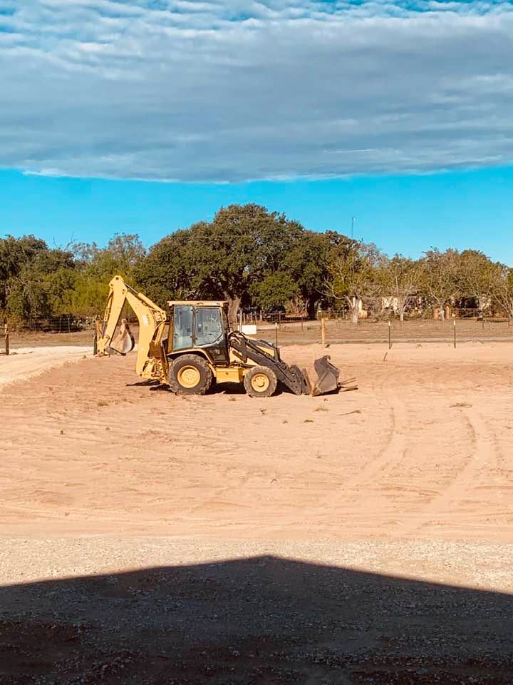 This is the yellow tractor that the water well company left on our property over the weekend.